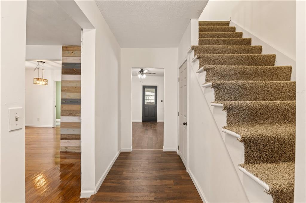 403 9th Street Windber, PA 15963 - Photo 4 of 34 a view of a hallway with wooden floor and entryway