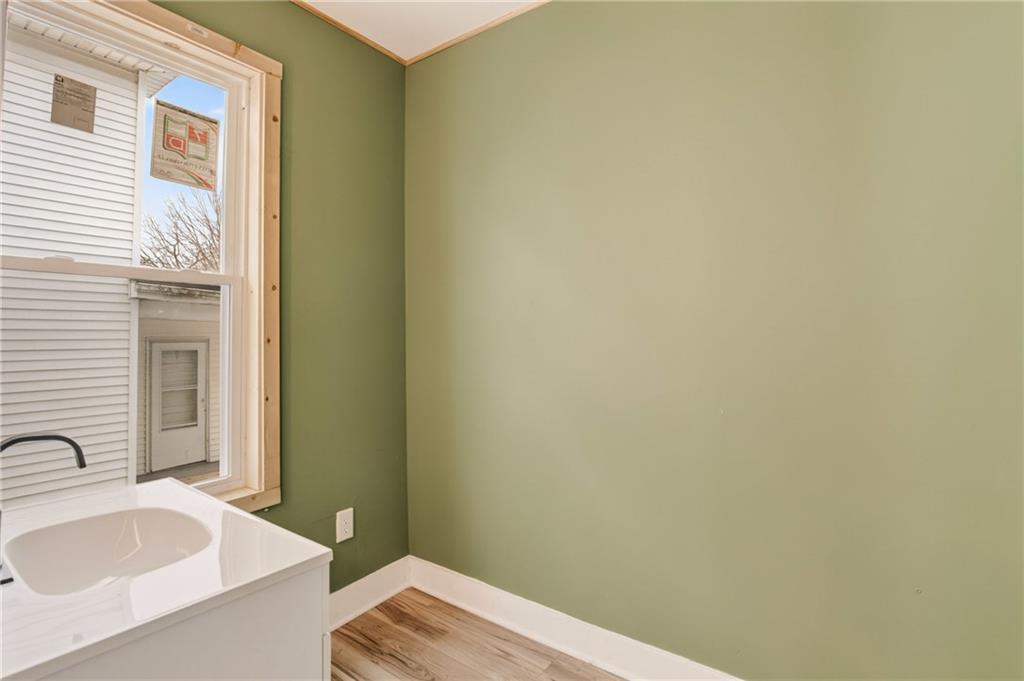 403 9th Street Windber, PA 15963 - Photo 10 of 34 a bathroom with a sink and a granite countertop