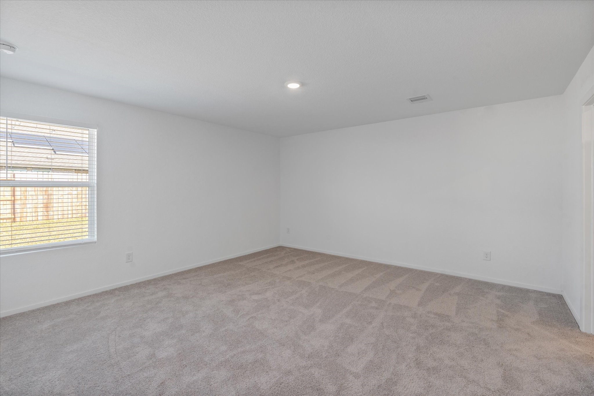 28922 Rustic Windmill Way Hockley, TX 77447 - Photo 17 of 24 an empty room with a window