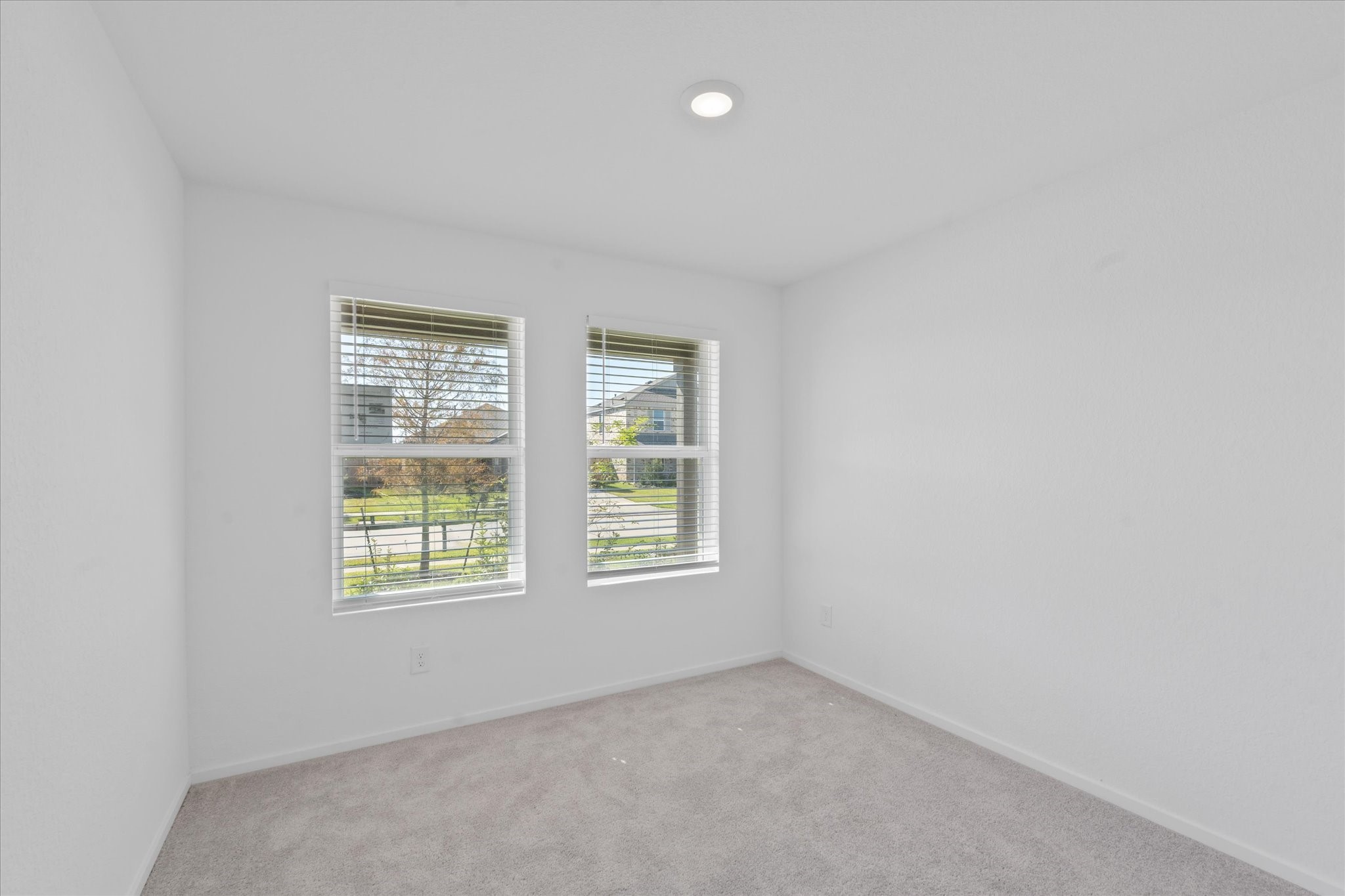 28922 Rustic Windmill Way Hockley, TX 77447 - Photo 4 of 24 an empty room with windows