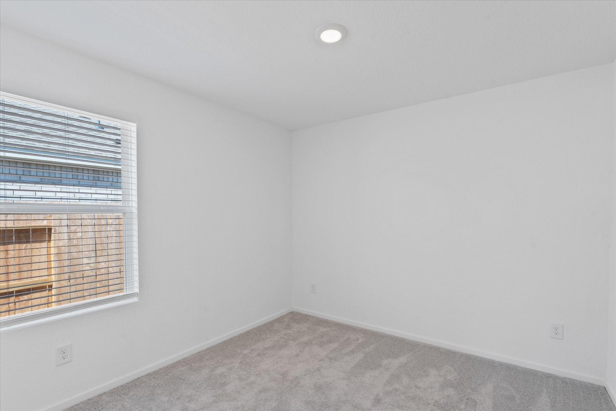 28922 Rustic Windmill Way Hockley, TX 77447 - Photo 7 of 24 a view of an empty room with a window