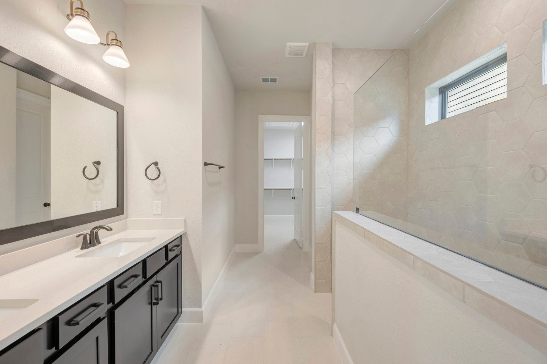 2722 Cottage Place Rosharon, TX 77583 - Photo 40 of 50 a spacious bathroom with a shower sink and a mirror