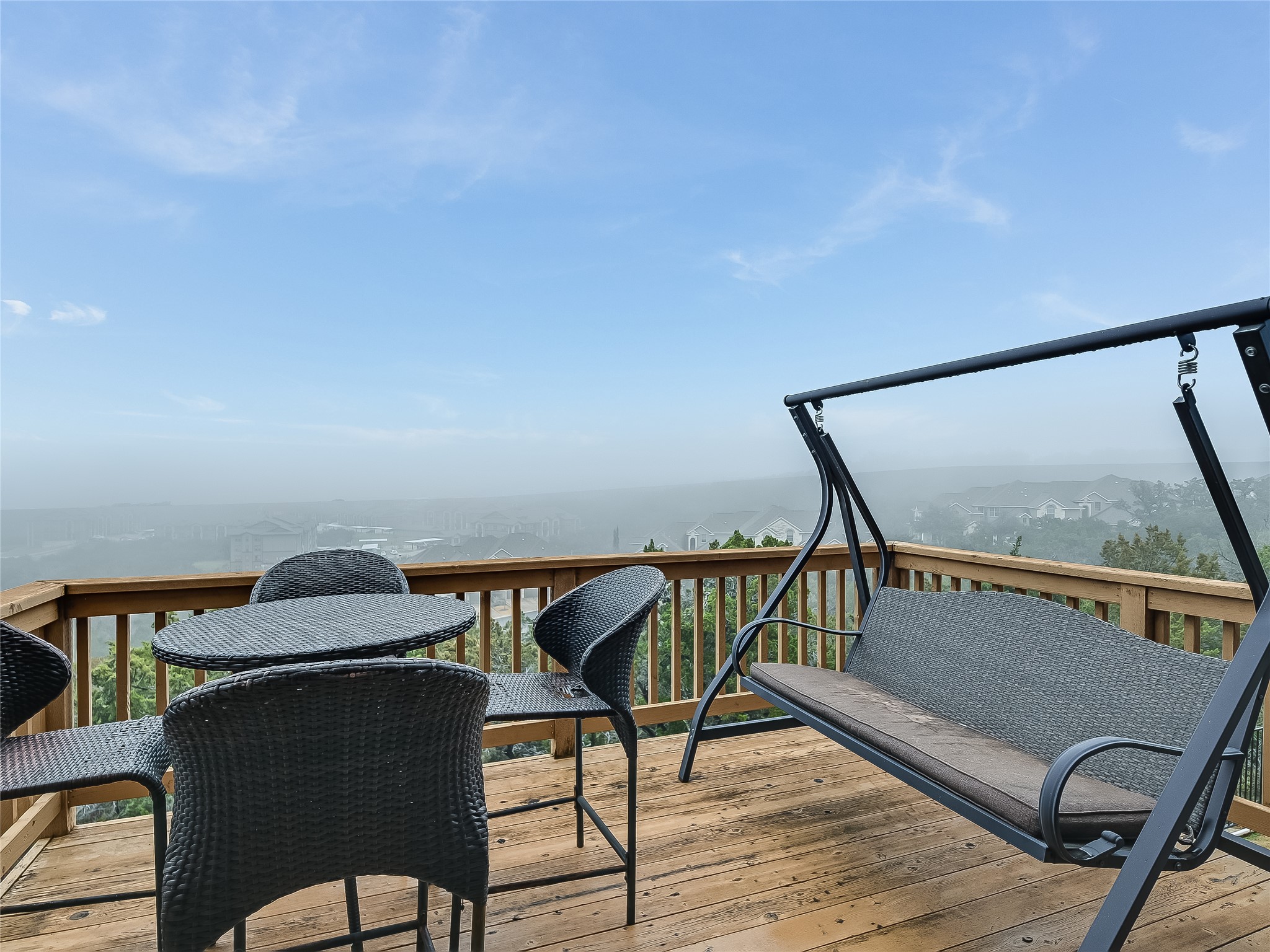 230 Sunrise Ridge Loop Austin, TX 78738 - Photo 27 of 27 A spacious wooden deck provides an elevated vantage point for enjoying the surrounding scenery.