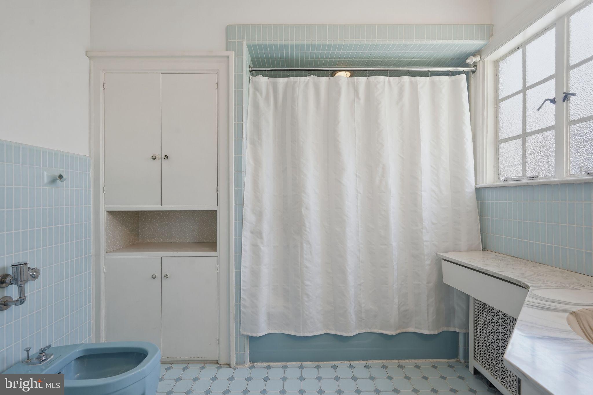408 Upland Road Elkins Park, PA 19027 - Photo 19 of 41 a bathroom with a sink and toilet