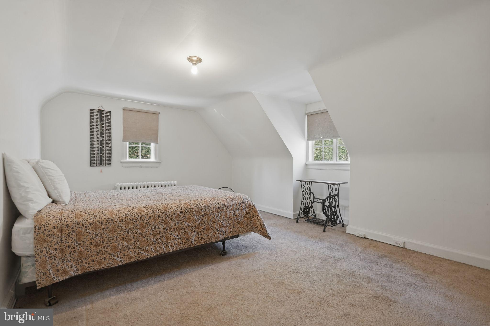 408 Upland Road Elkins Park, PA 19027 - Photo 25 of 41 a bedroom with a bed and a window