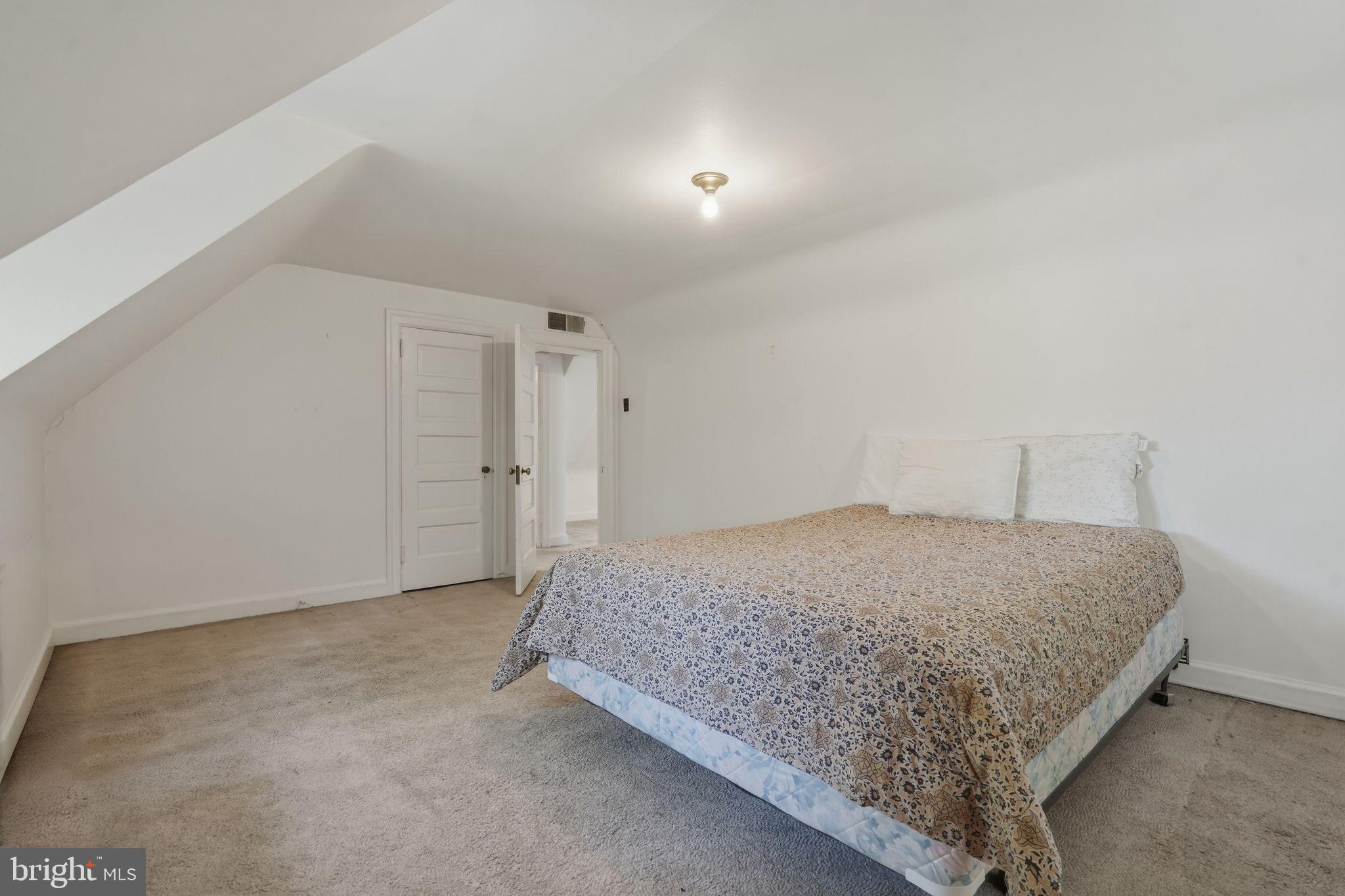 408 Upland Road Elkins Park, PA 19027 - Photo 26 of 41 a room with a bed and a cabinets