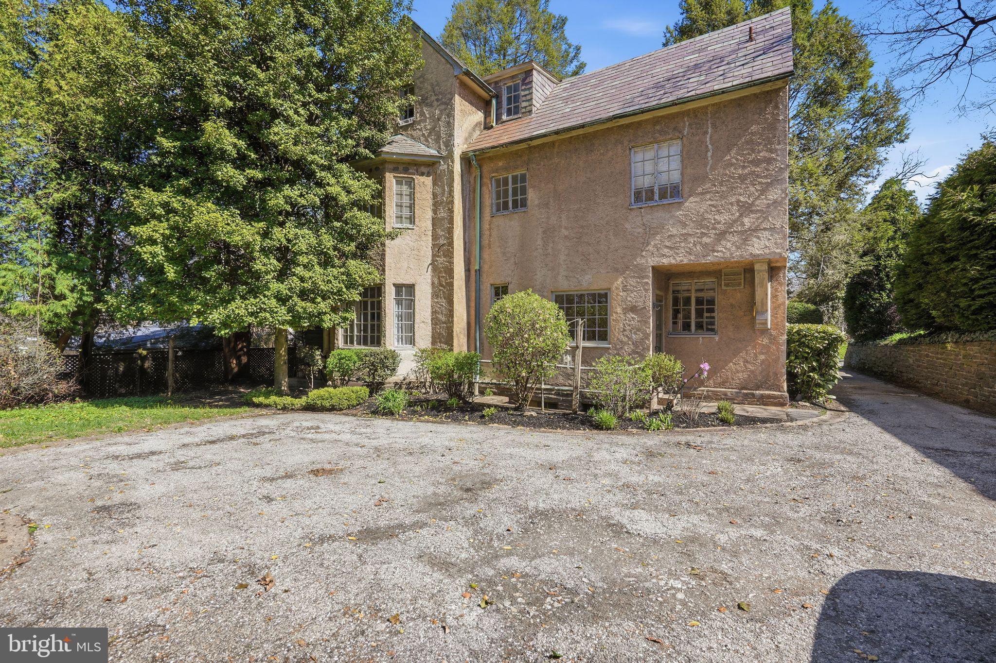 408 Upland Road Elkins Park, PA 19027 - Photo 35 of 41 a front view of a house with garden