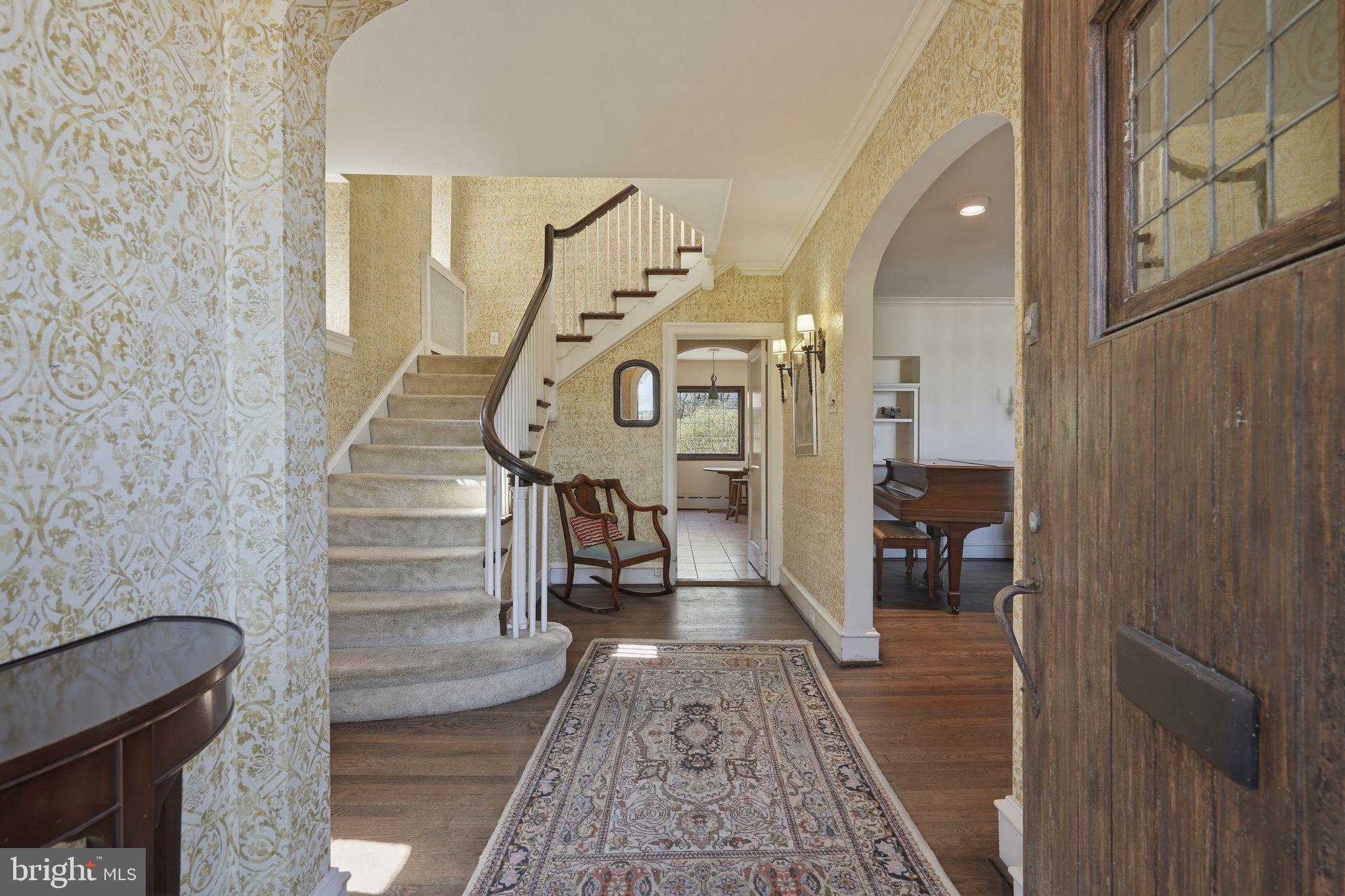408 Upland Road Elkins Park, PA 19027 - Photo 4 of 41 a view of entryway and hall with wooden floor