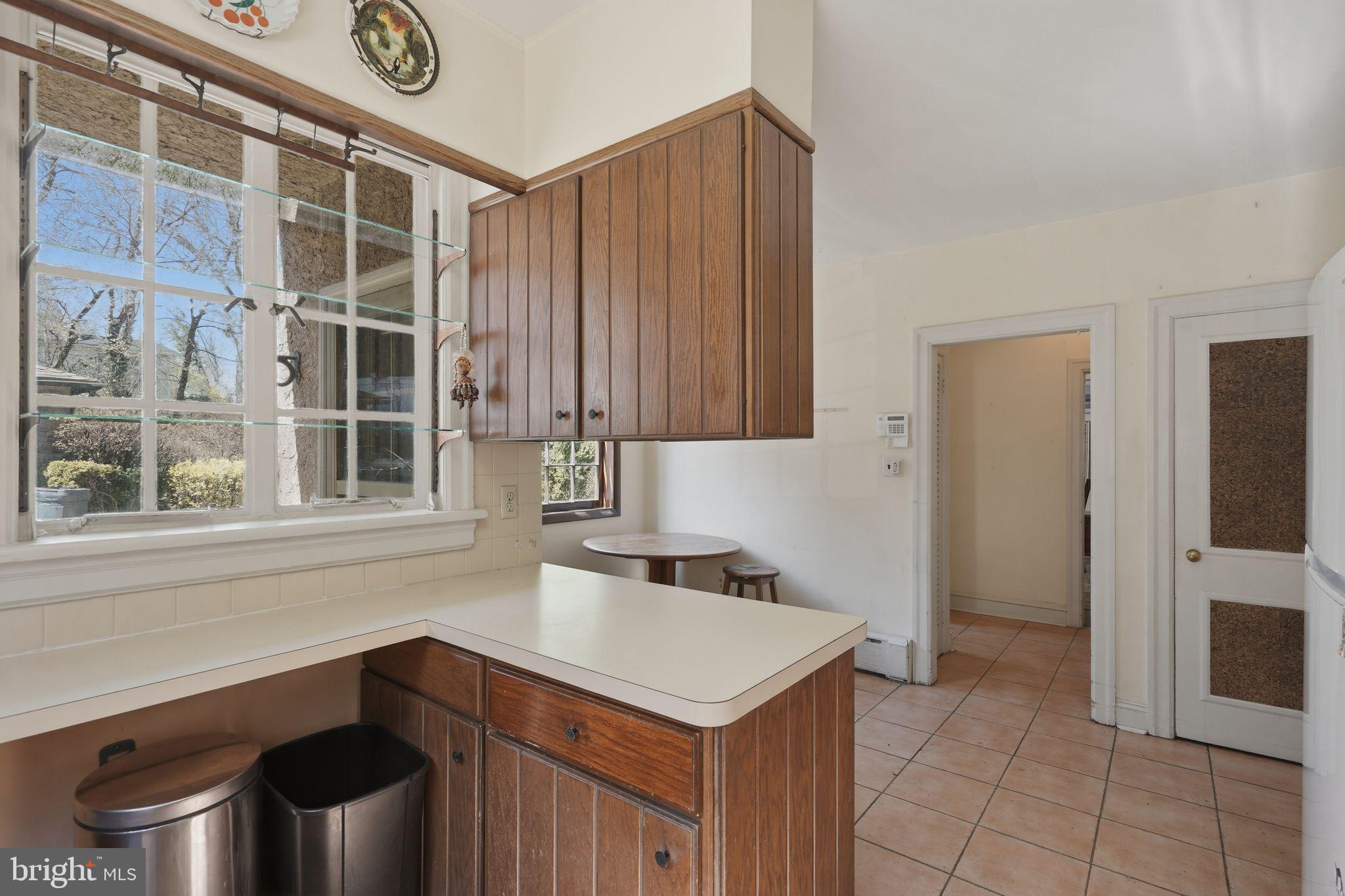 408 Upland Road Elkins Park, PA 19027 - Photo 10 of 41 a kitchen with a sink and a refrigerator