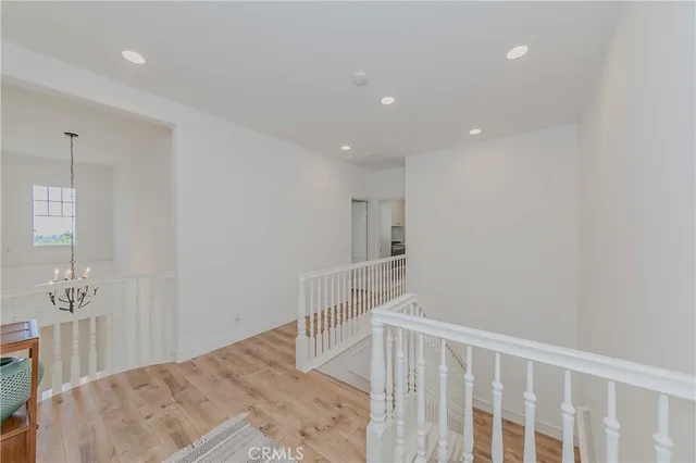 a view of a dining room with furniture and a window