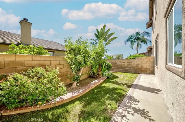 a bathroom with a toilet sink vanity and mirror