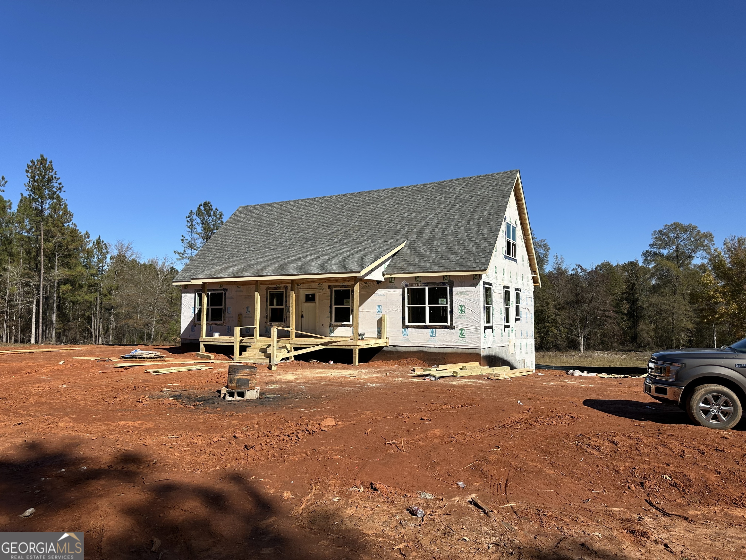 151 Nancy Lane Forsyth, GA 31029 - Photo 4 of 13 a view of a house with car parked