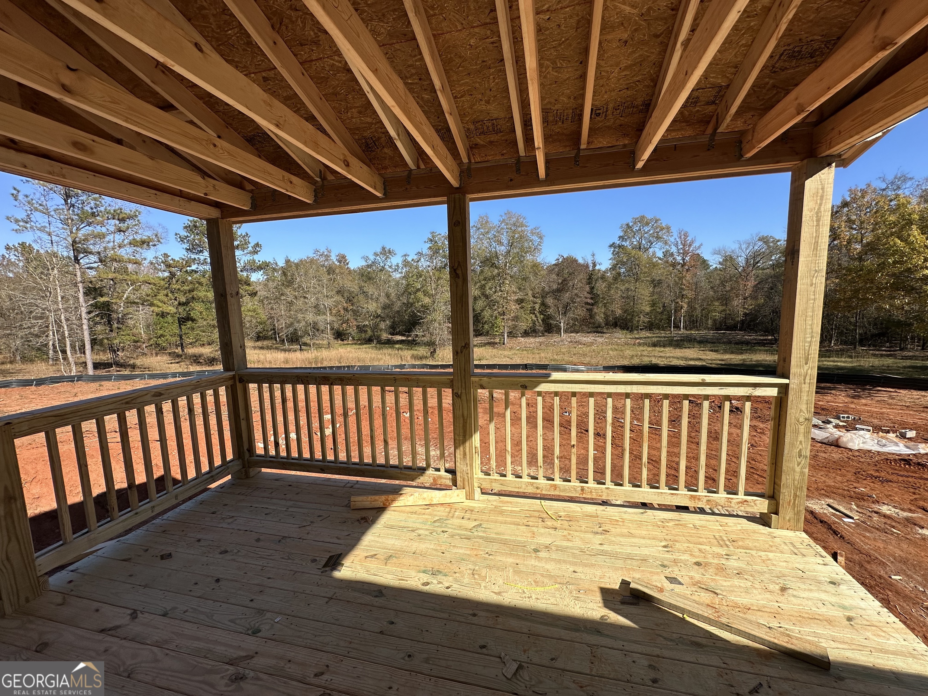 151 Nancy Lane Forsyth, GA 31029 - Photo 8 of 13 a view of a wooden deck