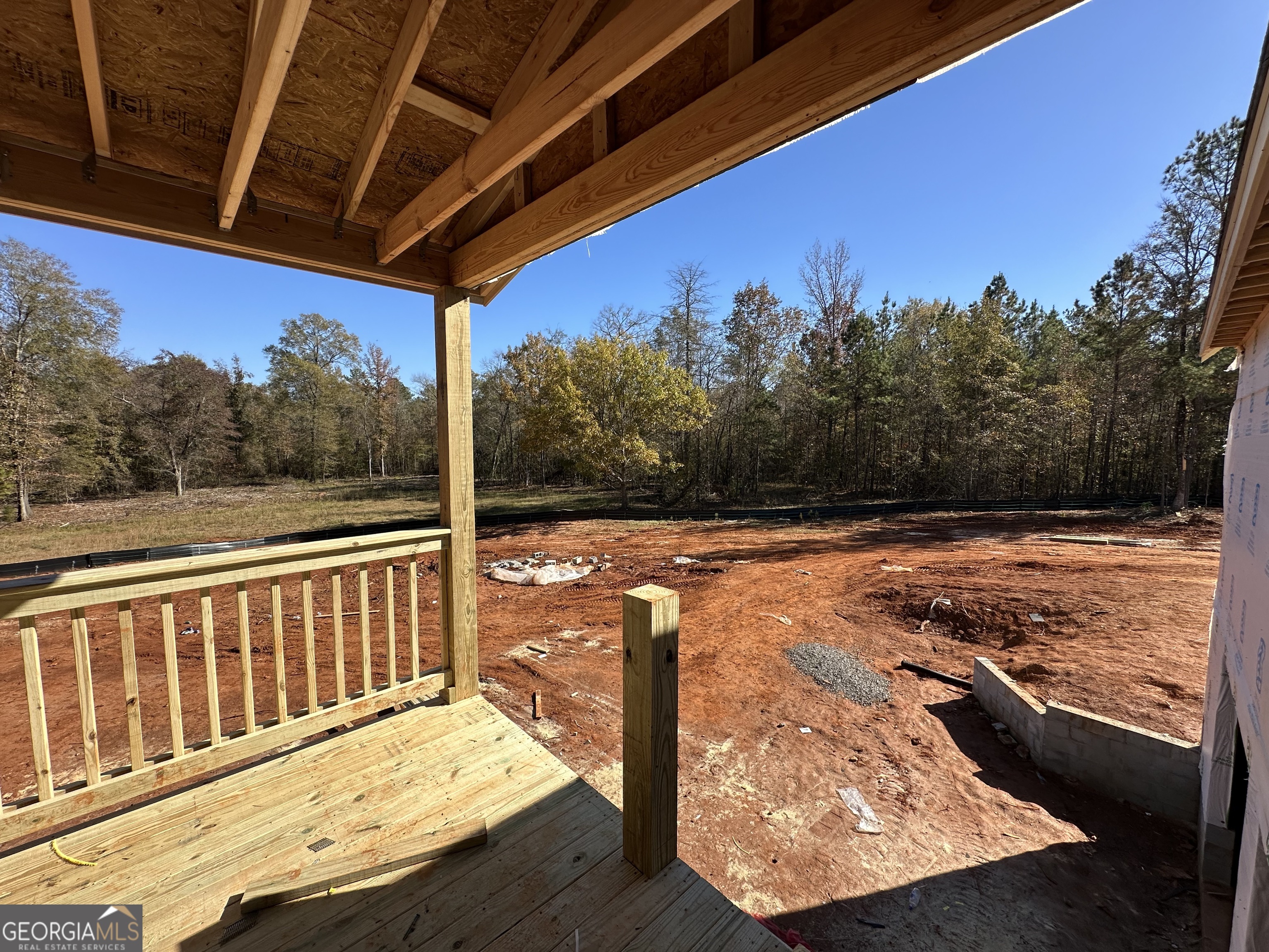151 Nancy Lane Forsyth, GA 31029 - Photo 9 of 13 a view of a two chairs in the balcony