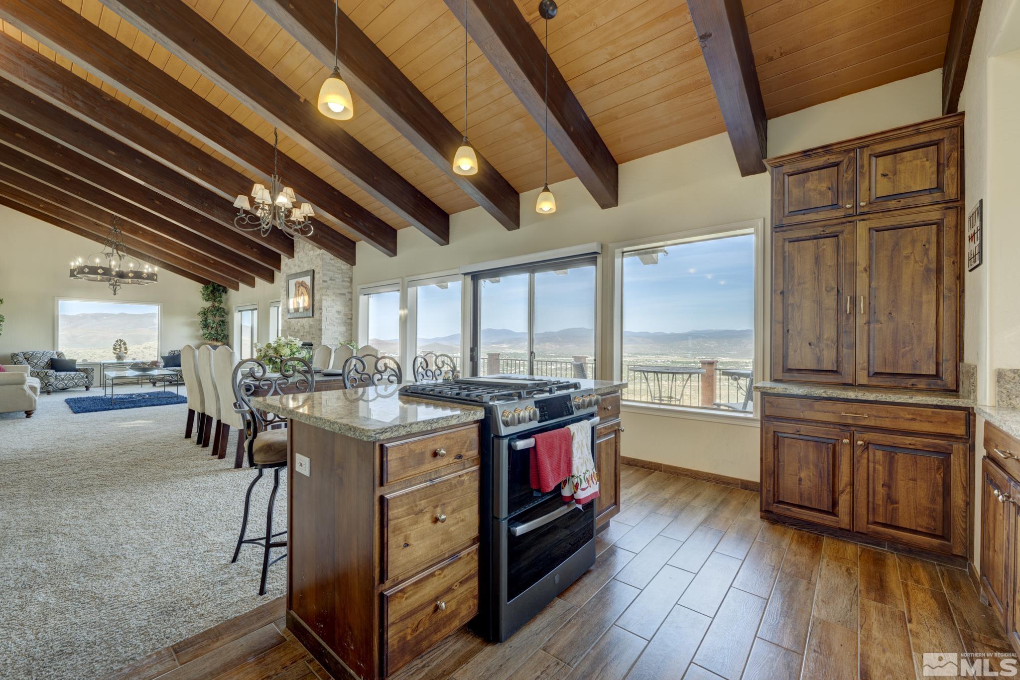 3760 Paradise View Carson City, NV 89703 - Photo 12 of 40 a view of a kitchen with cabinets and wooden floor