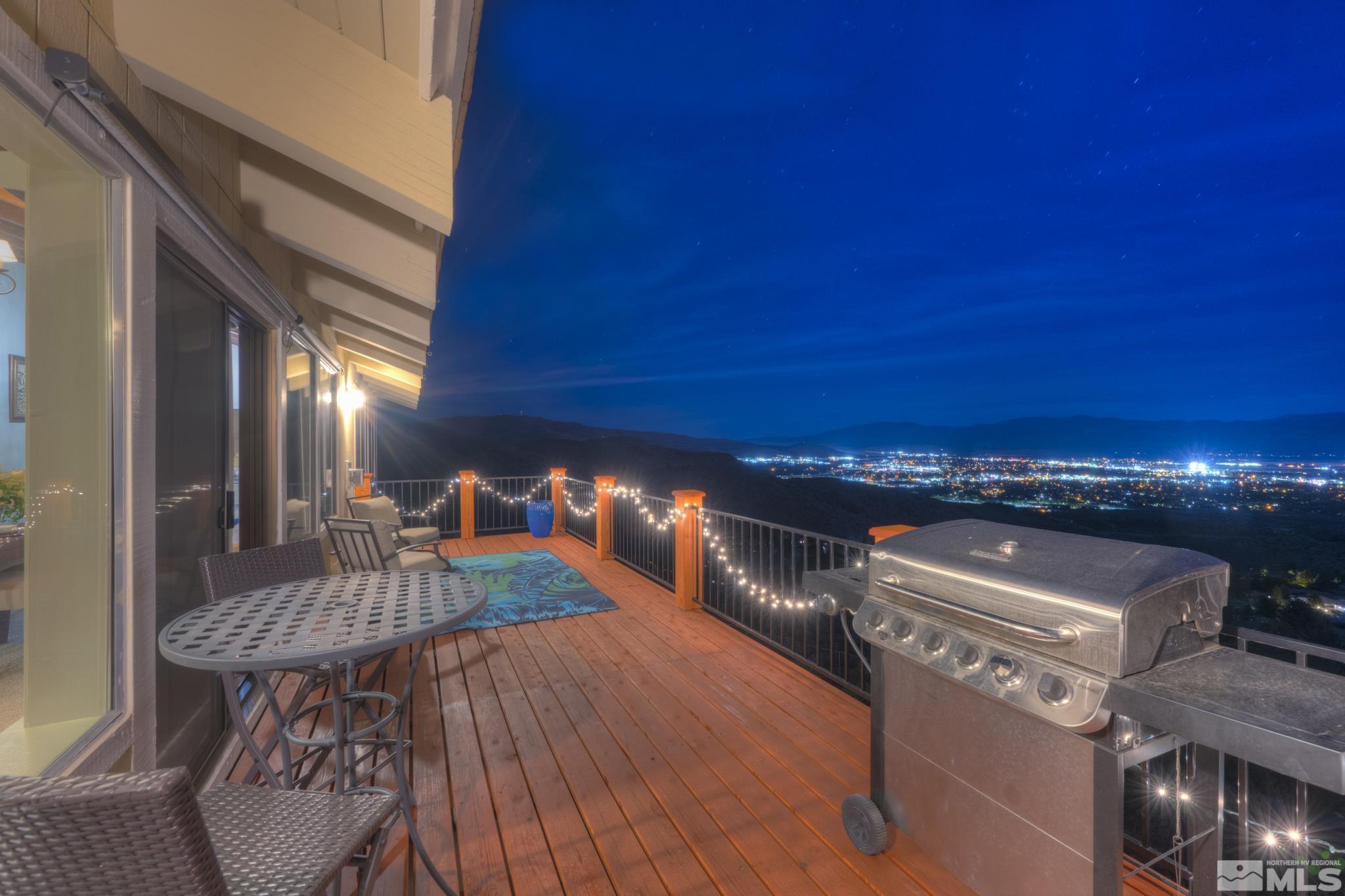 3760 Paradise View Carson City, NV 89703 - Photo 2 of 40 a balcony view with couple of chairs