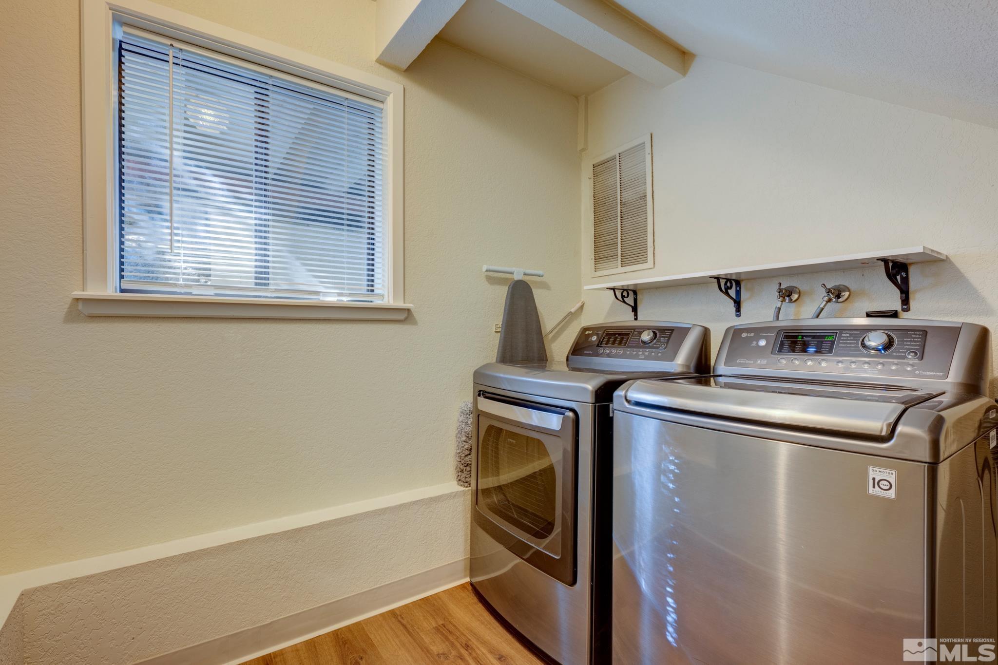 3760 Paradise View Carson City, NV 89703 - Photo 31 of 40 a utility room with washer and dryer