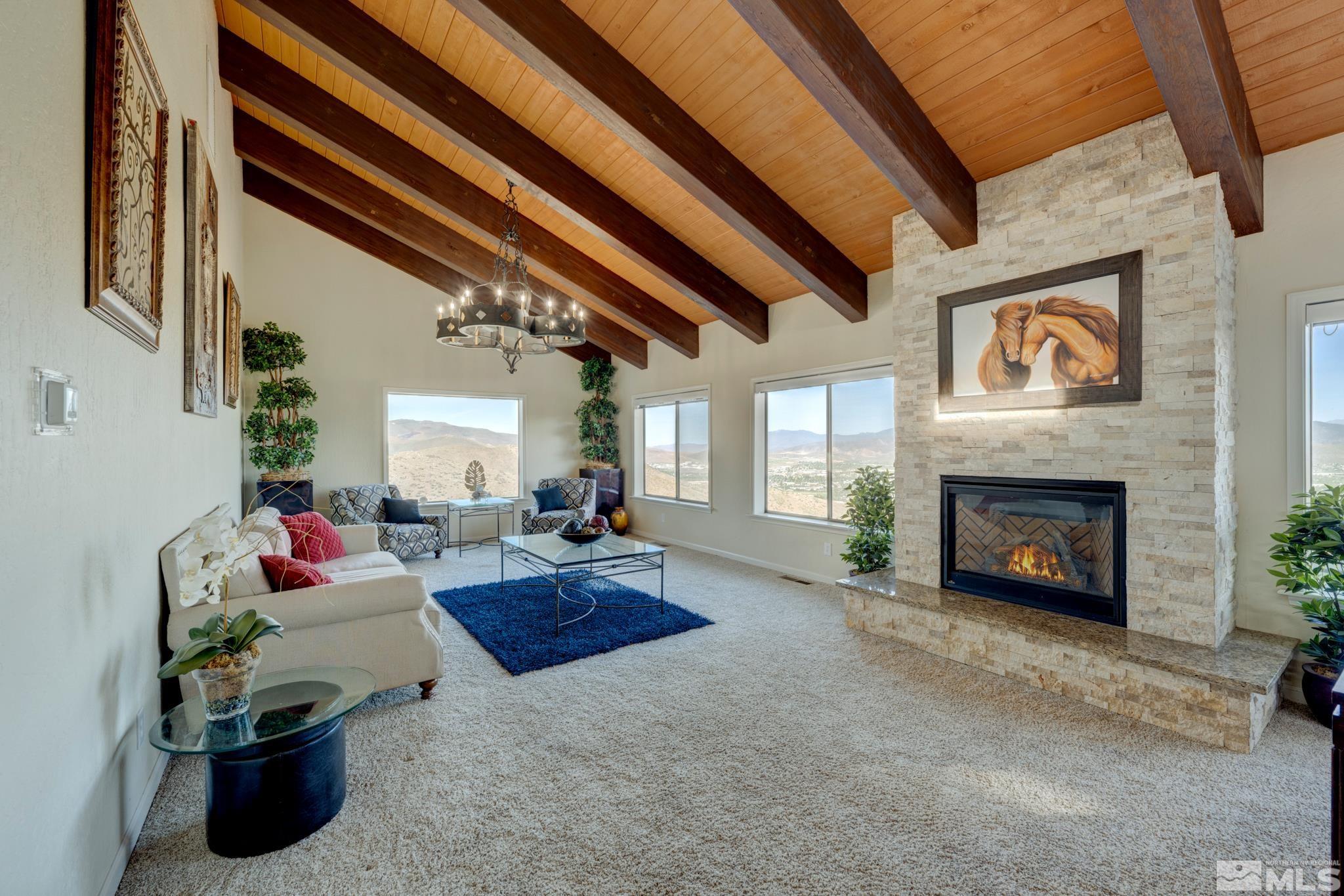 3760 Paradise View Carson City, NV 89703 - Photo 7 of 40 a living room with furniture and a fireplace