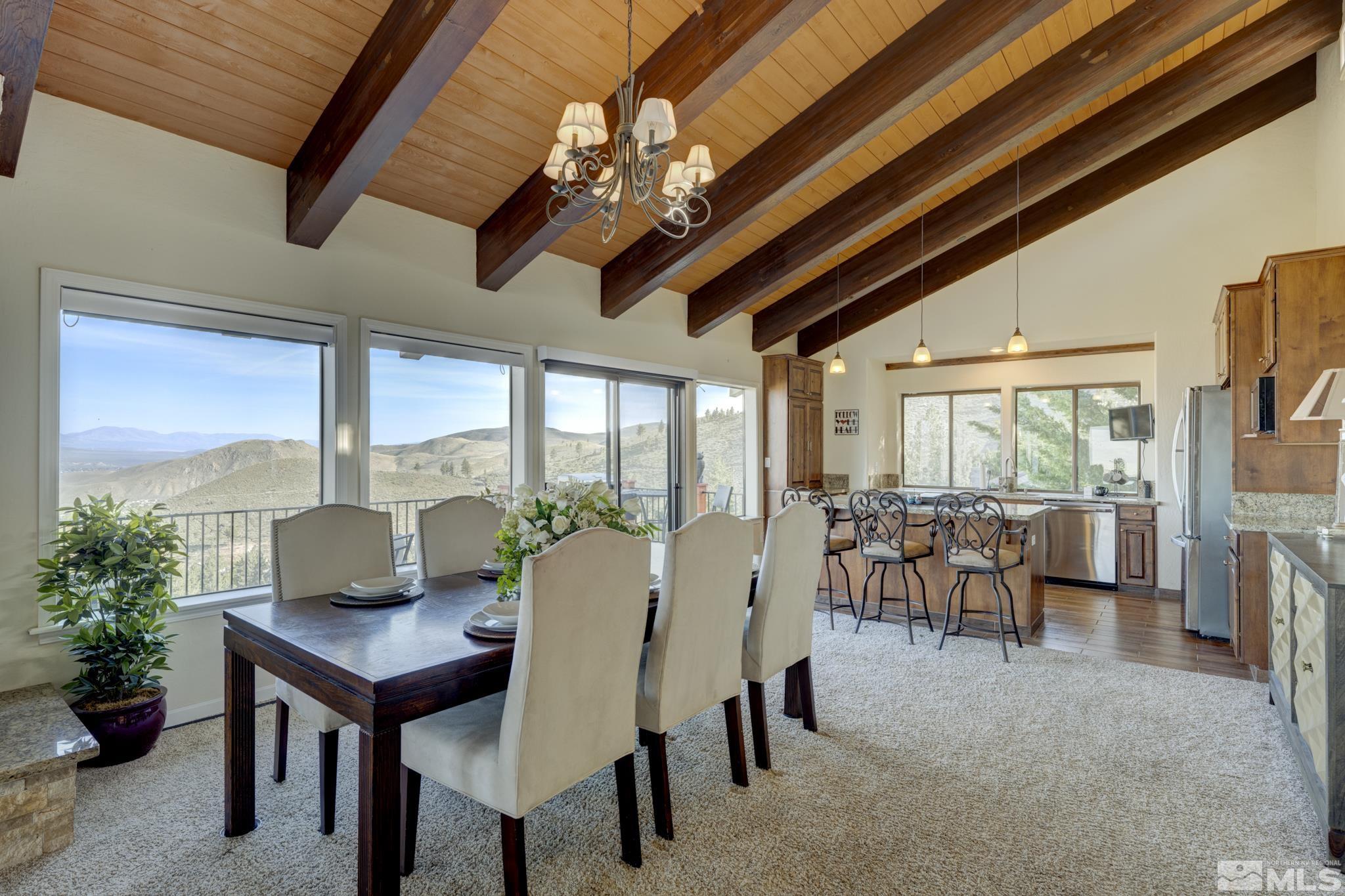 3760 Paradise View Carson City, NV 89703 - Photo 9 of 40 a view of a dining room with furniture window and outside view