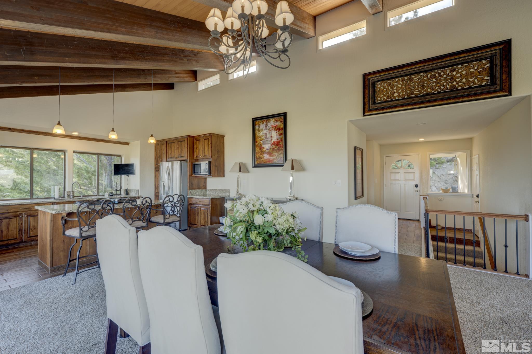 3760 Paradise View Carson City, NV 89703 - Photo 10 of 40 a view of a dining room with furniture window and outside view
