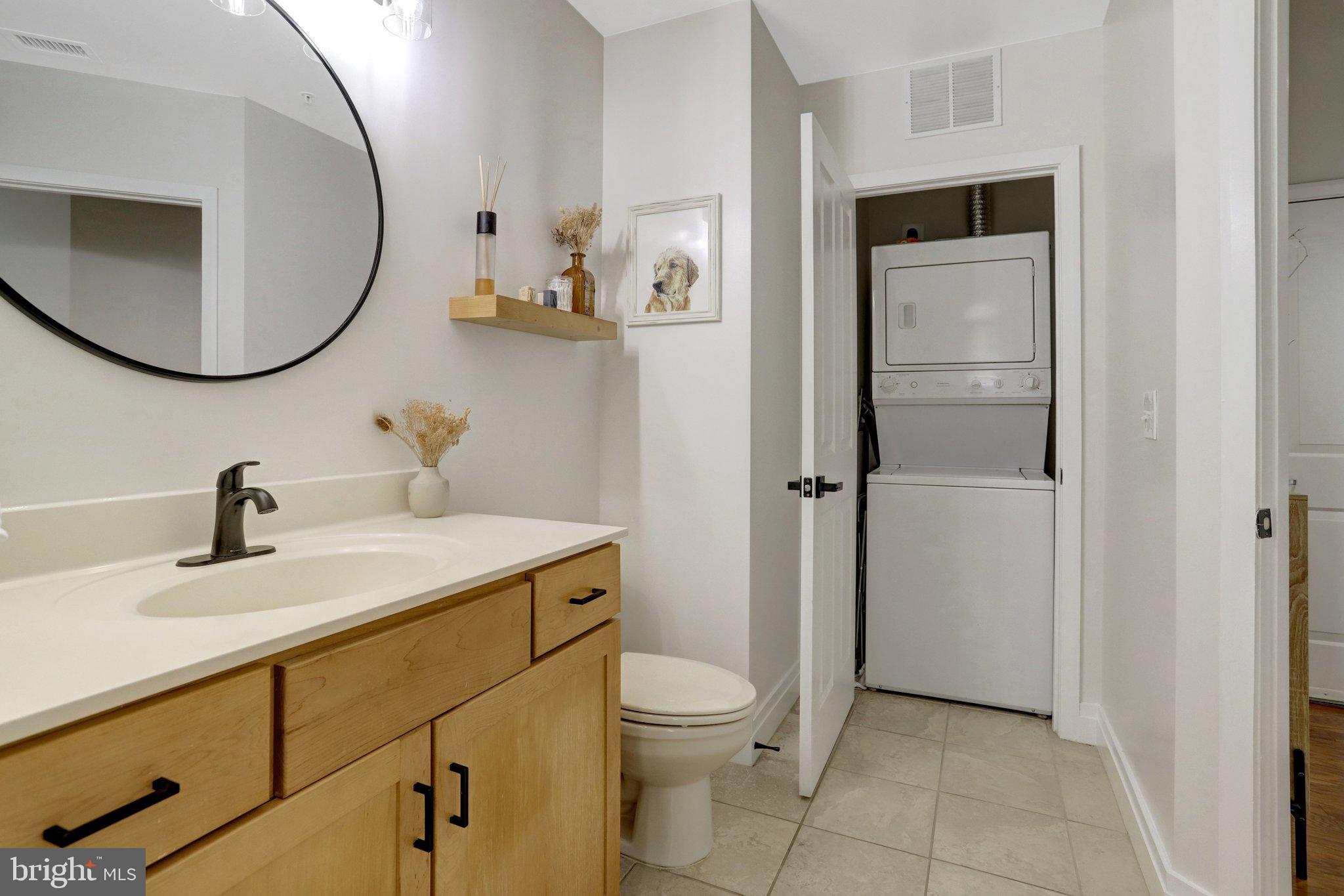 1201 North Garfield Street, Unit 206 Arlington, VA 22201 - Photo 21 of 33 Stackable laundry in 2nd en-suite