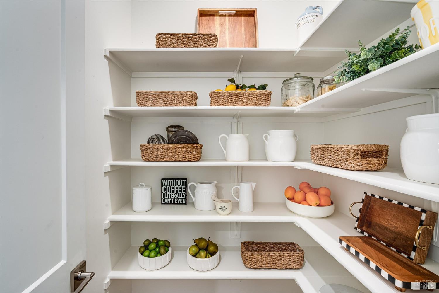 107 Grace Lane Napa, CA 94559 - Photo 16 of 39 a shelf with cup and plates