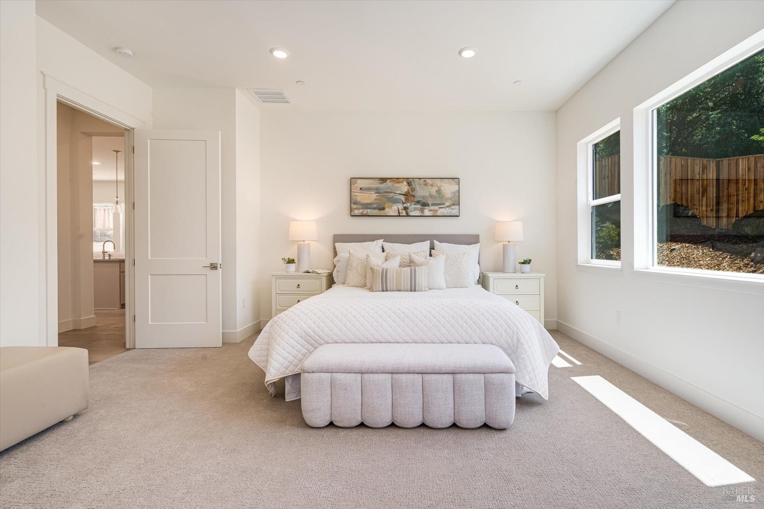 107 Grace Lane Napa, CA 94559 - Photo 17 of 39 a bedroom with a bed and large window