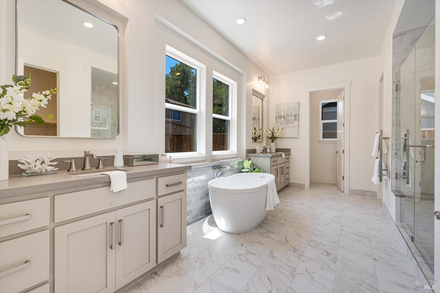 107 Grace Lane Napa, CA 94559 - Photo 20 of 39 a spacious bathroom with a granite countertop sink and a bathtub