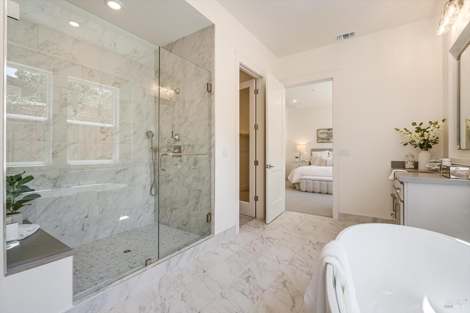 107 Grace Lane Napa, CA 94559 - Photo 21 of 39 a bathroom with a sink and a mirror with bathtub