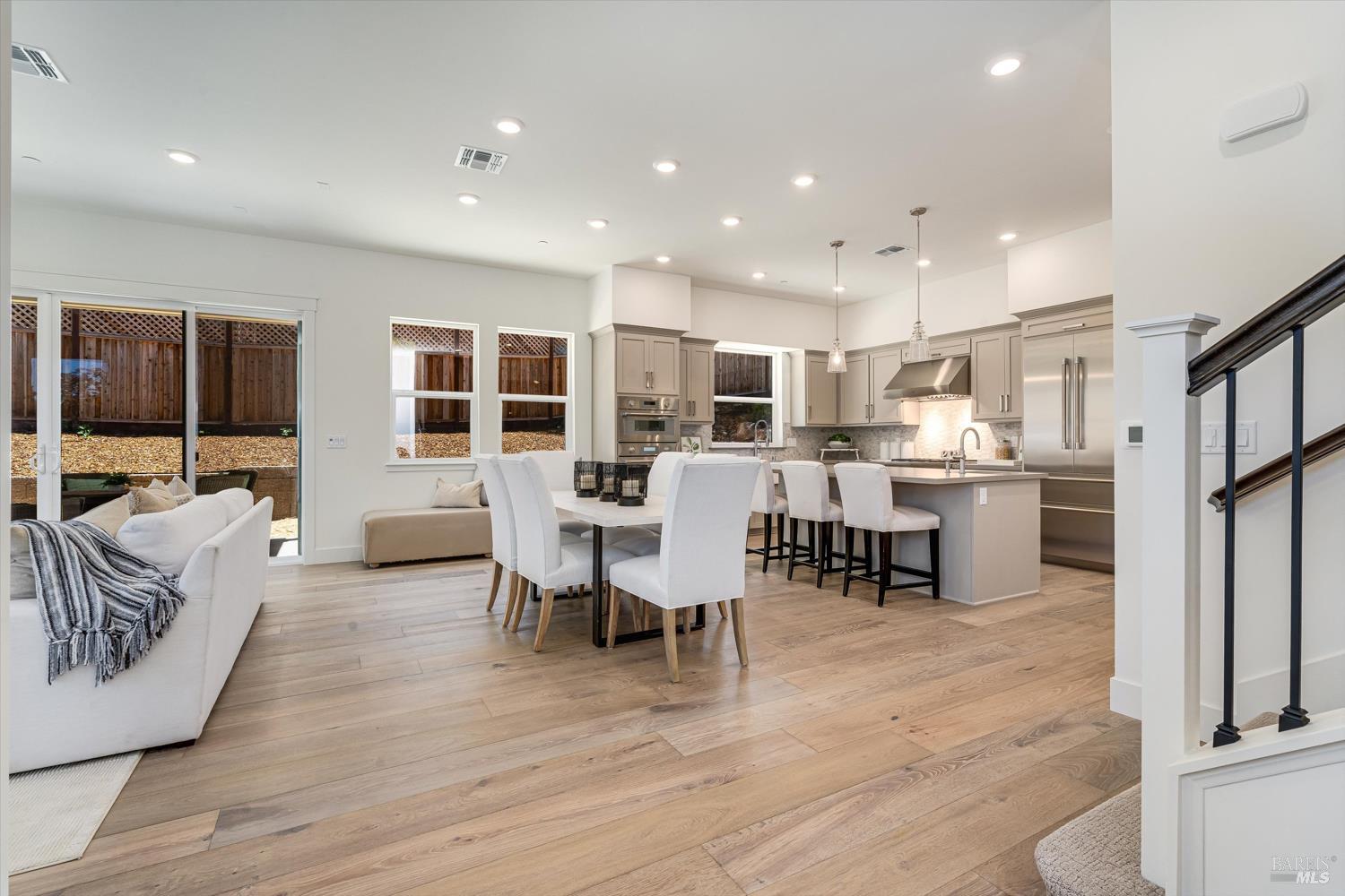 107 Grace Lane Napa, CA 94559 - Photo 28 of 39 a living room with lots of furniture and kitchen view