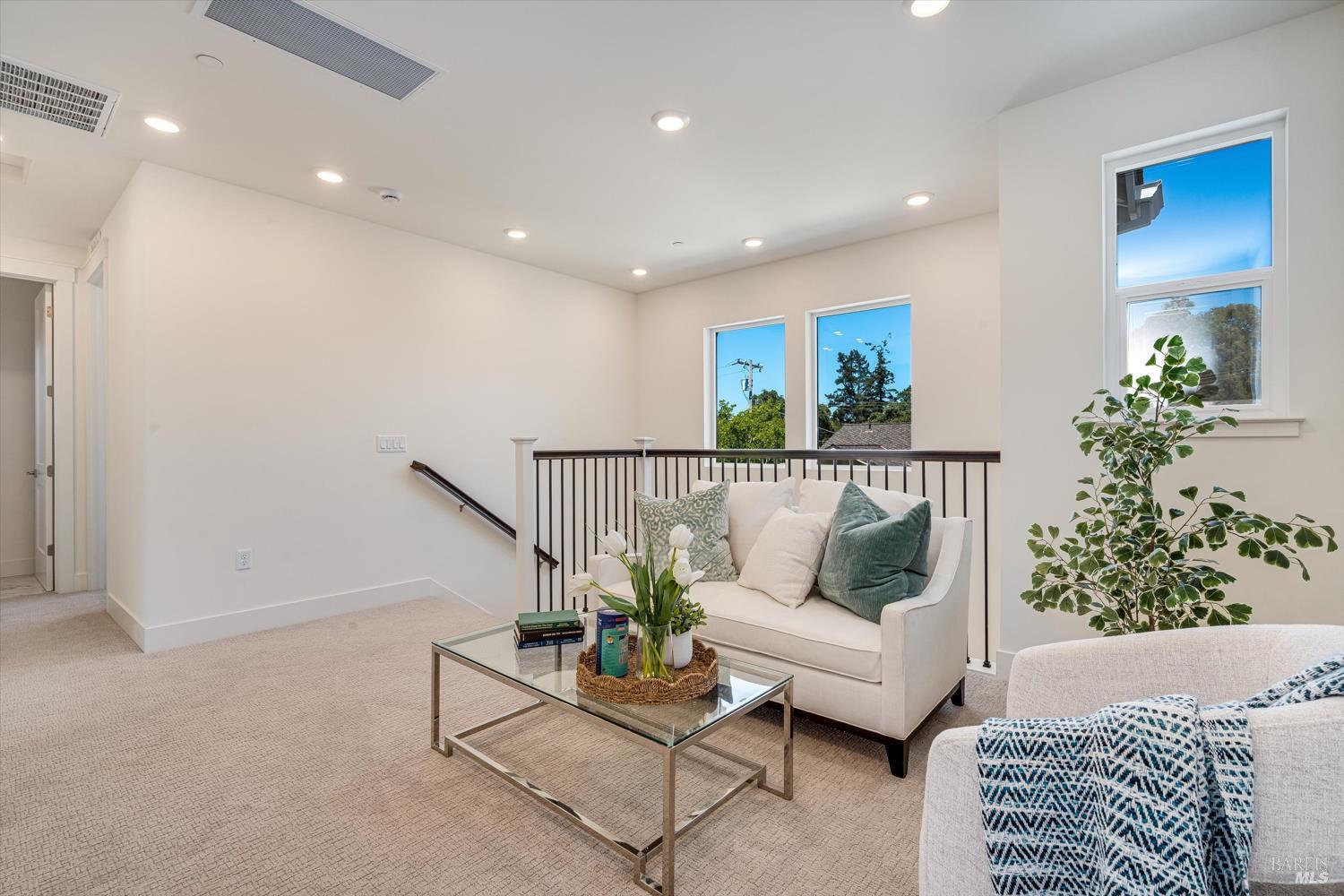 107 Grace Lane Napa, CA 94559 - Photo 30 of 39 a living room with furniture and flowers