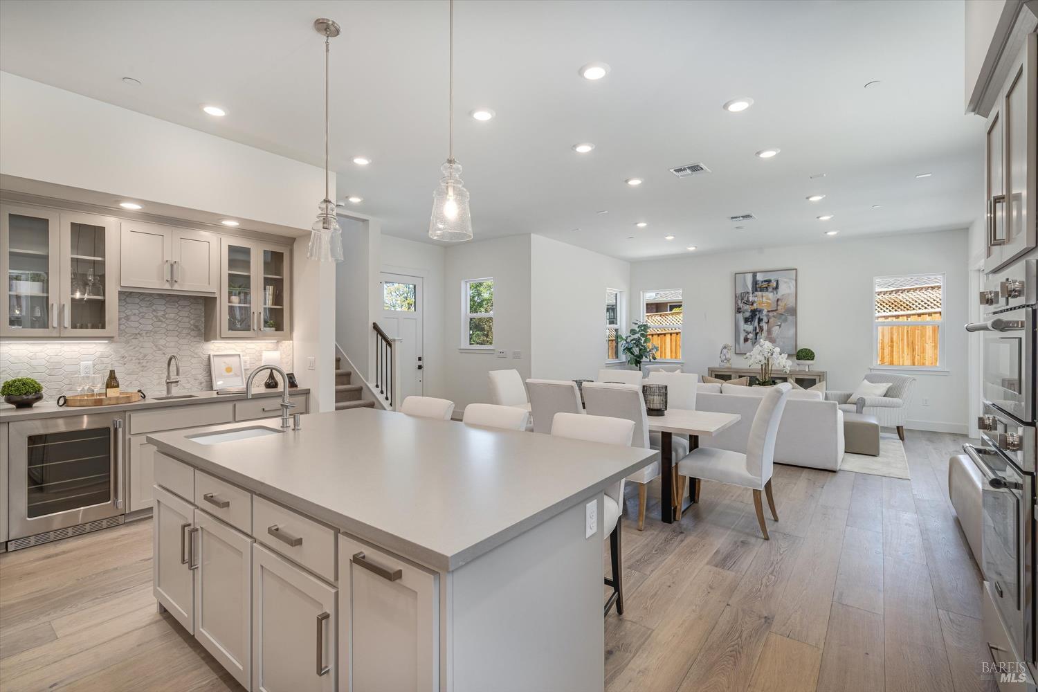 107 Grace Lane Napa, CA 94559 - Photo 5 of 39 a large kitchen with cabinets table and chairs