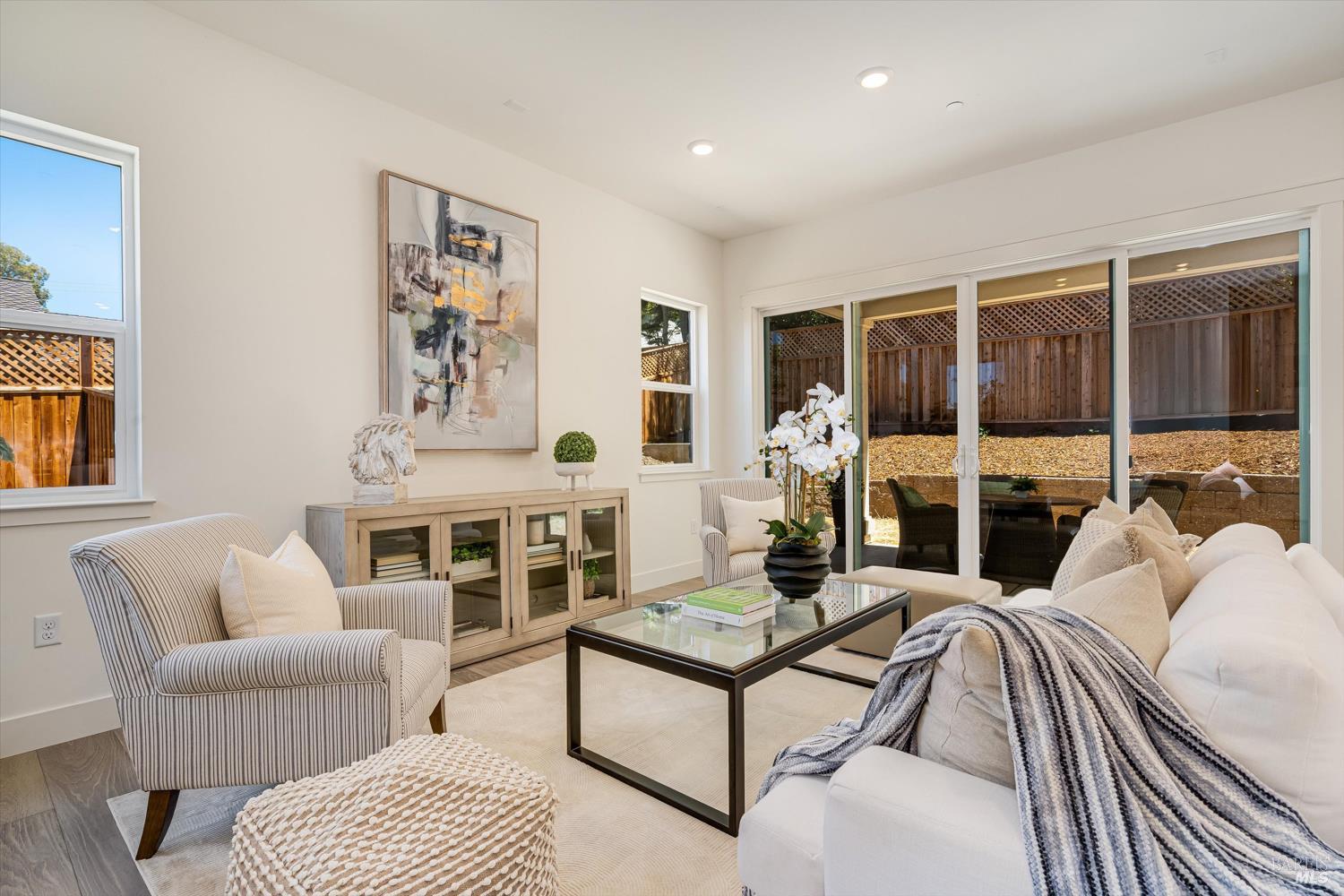 107 Grace Lane Napa, CA 94559 - Photo 6 of 39 a living room with furniture and large windows