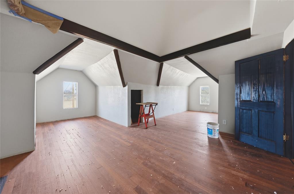 8640 Highway 198 Canton, TX 75103 - Photo 14 of 40 a view of a livingroom with wooden floor and stairs
