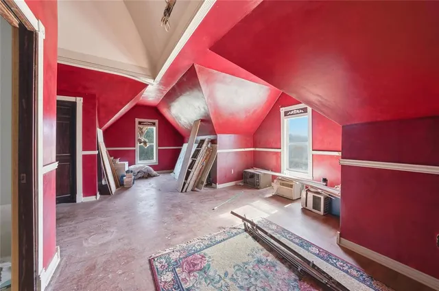 a room with furniture and wooden floor