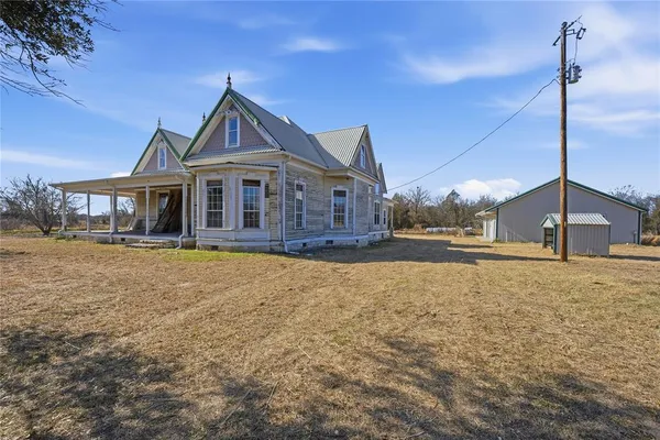 a view of a terrace with furniture