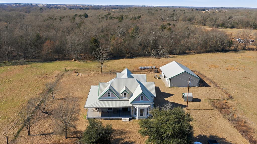 8640 Highway 198 Canton, TX 75103 - Photo 24 of 40 an aerial view of a house with a yard