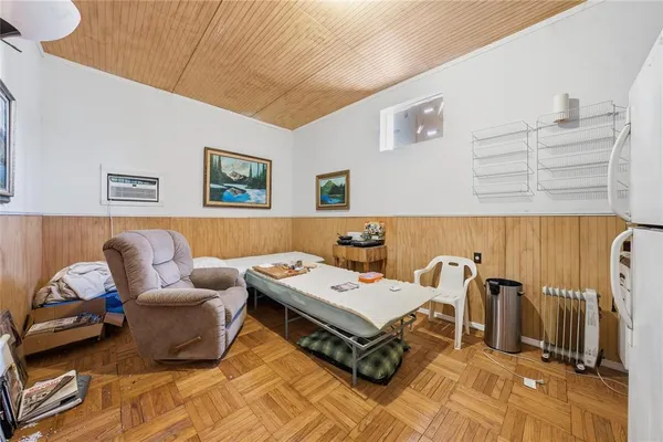 a bathroom with a sink toilet and shower curtain