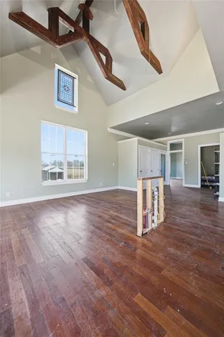 a view of a livingroom with wooden floor