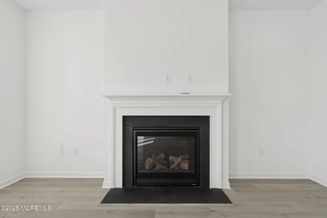 a living room with a fireplace