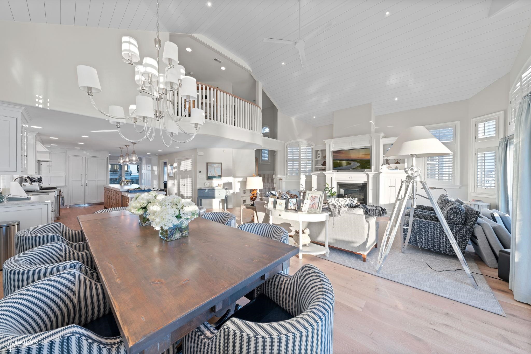 526 7th Street Avalon, NJ 08202 - Photo 11 of 24 a living room with lots of furniture and chandelier