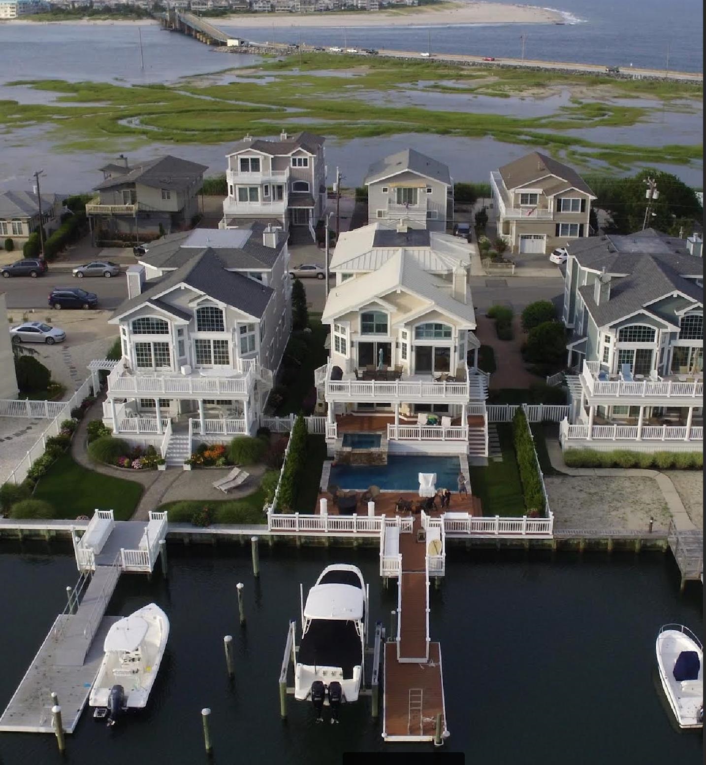 526 7th Street Avalon, NJ 08202 - Photo 4 of 24 an aerial view of multiple houses with outdoor space