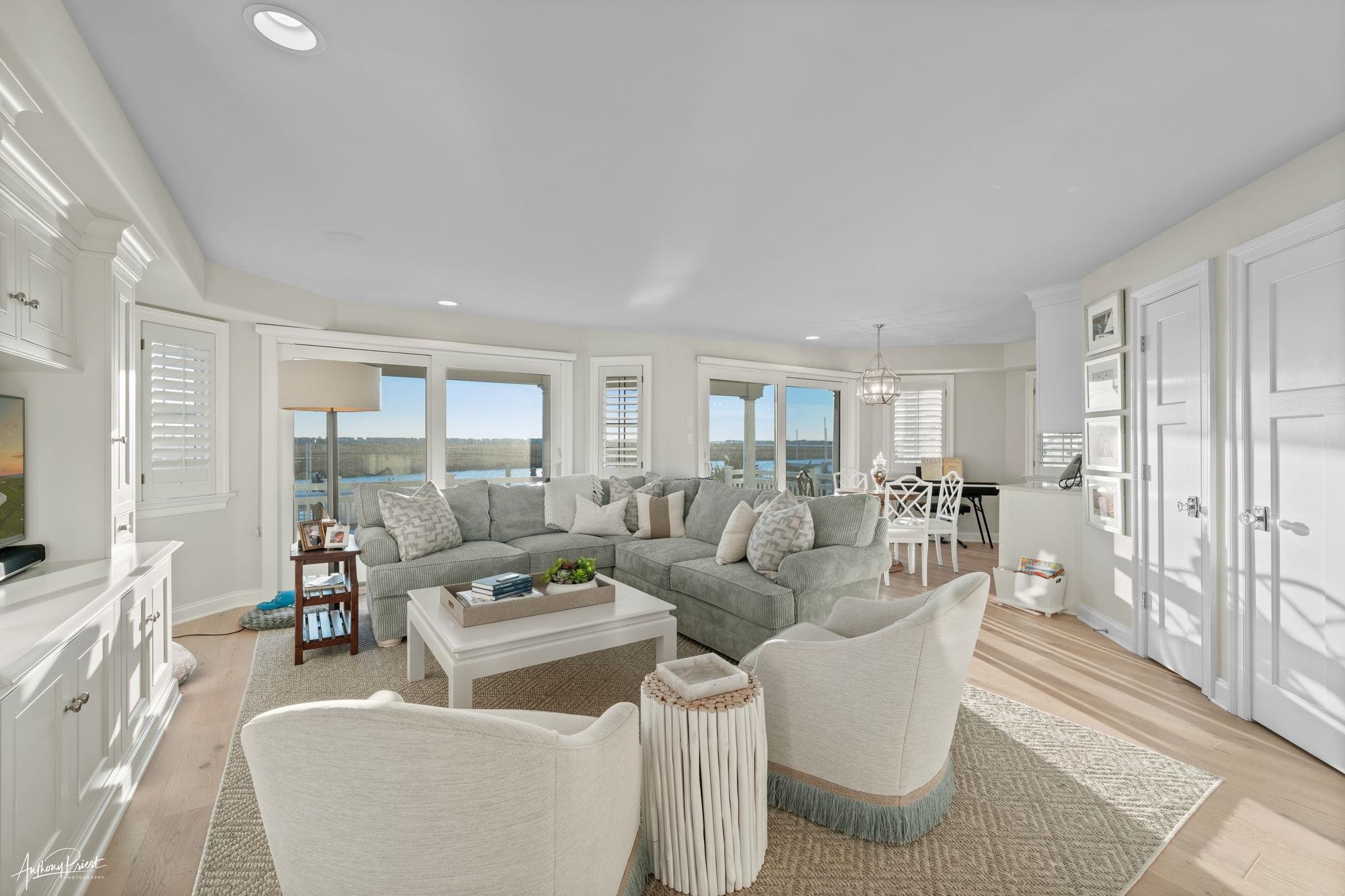 526 7th Street Avalon, NJ 08202 - Photo 7 of 24 a living room with furniture and a flat screen tv