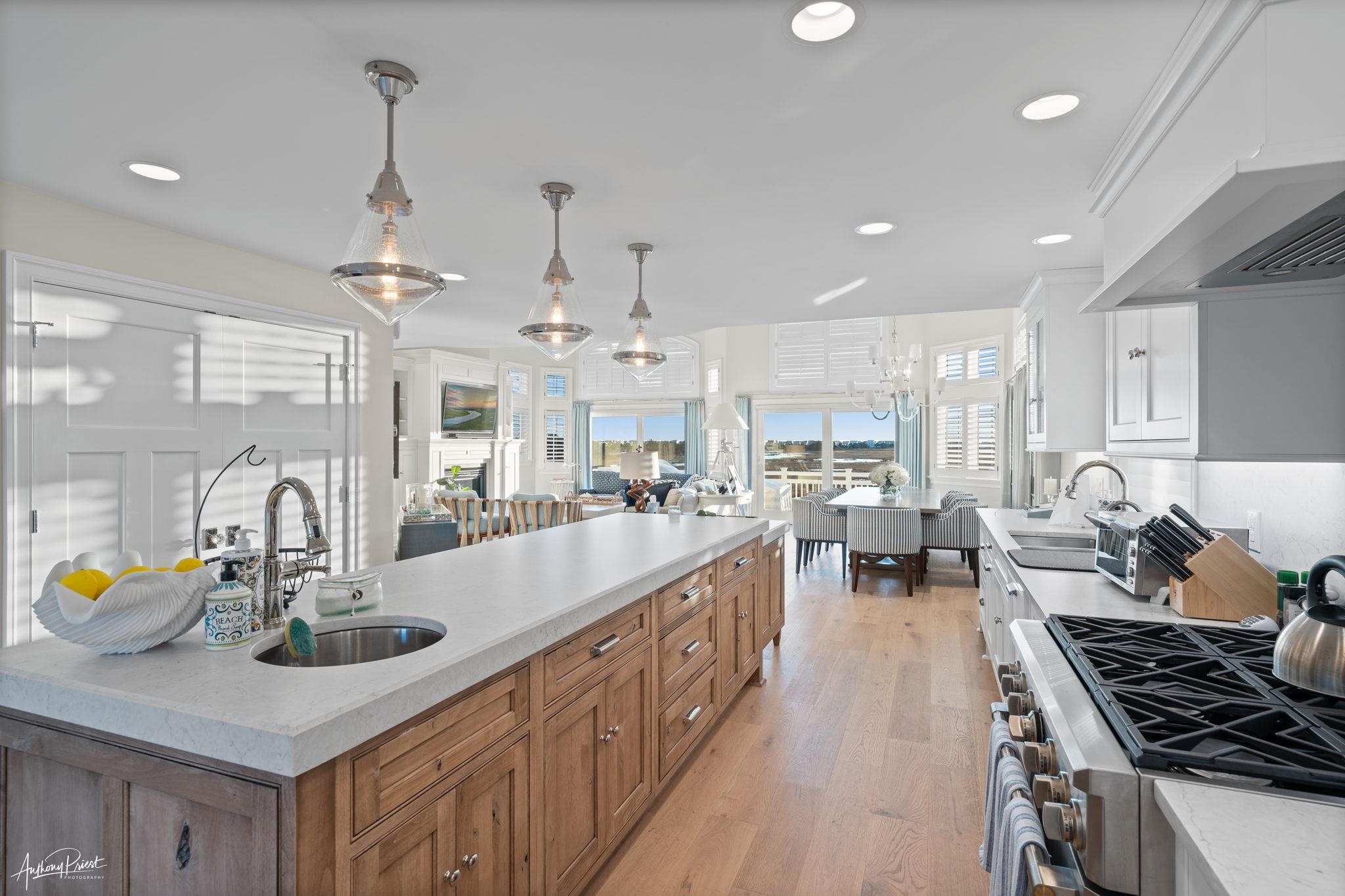 526 7th Street Avalon, NJ 08202 - Photo 9 of 24 a kitchen with counter space a sink appliances and cabinets