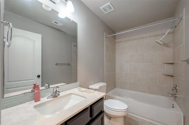 a view of empty room with windows