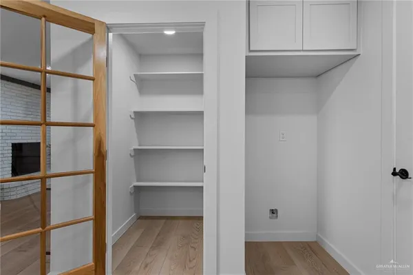 a view of a room with rack on the wall