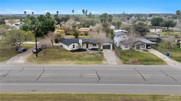 a view of swimming pool with an outdoor seating