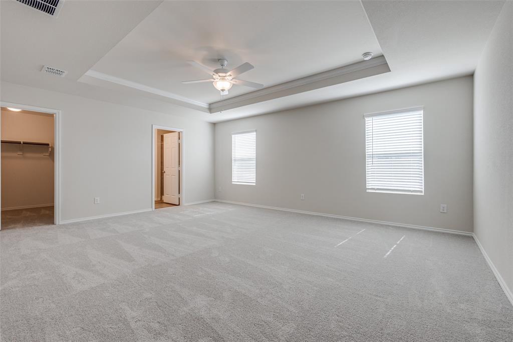 877 Table Rock Street Princeton, TX 75407 - Photo 12 of 25 a view of an empty room with a window