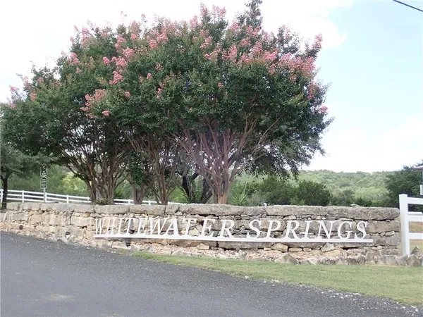 a view of park with trees