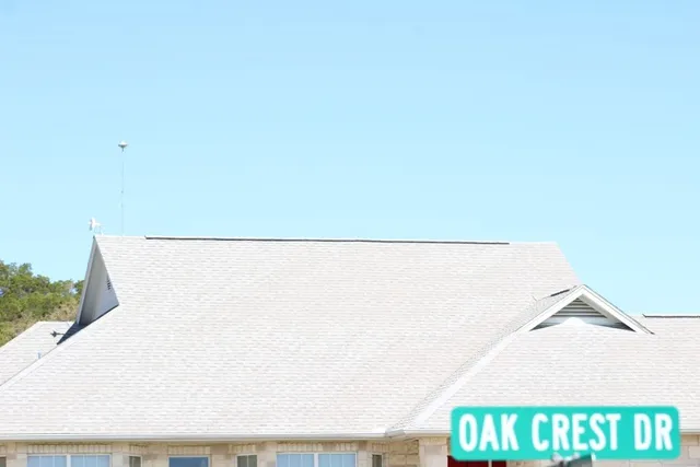 a view of a covered with trees in the background